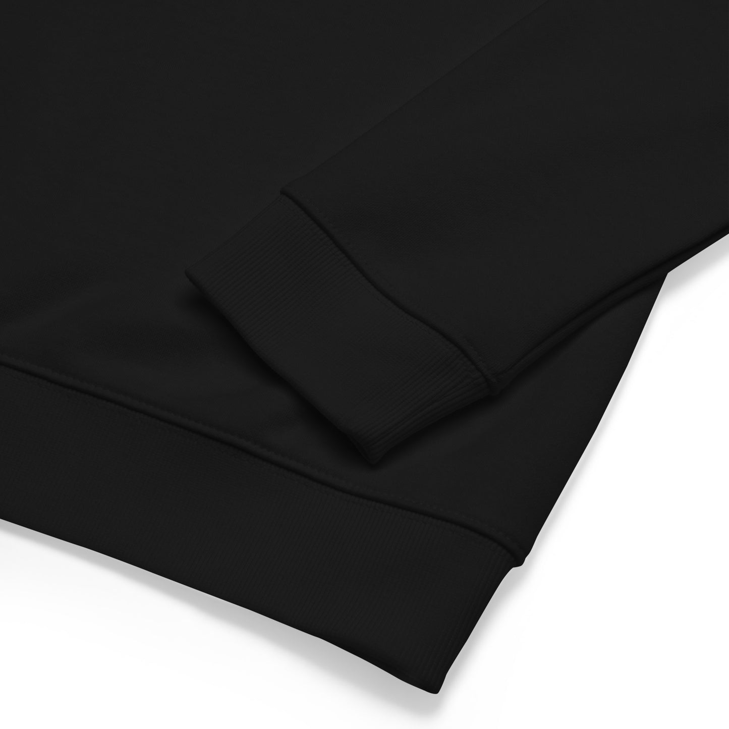  A close up a a black long sleeve shirt that shows the details of the cuffs