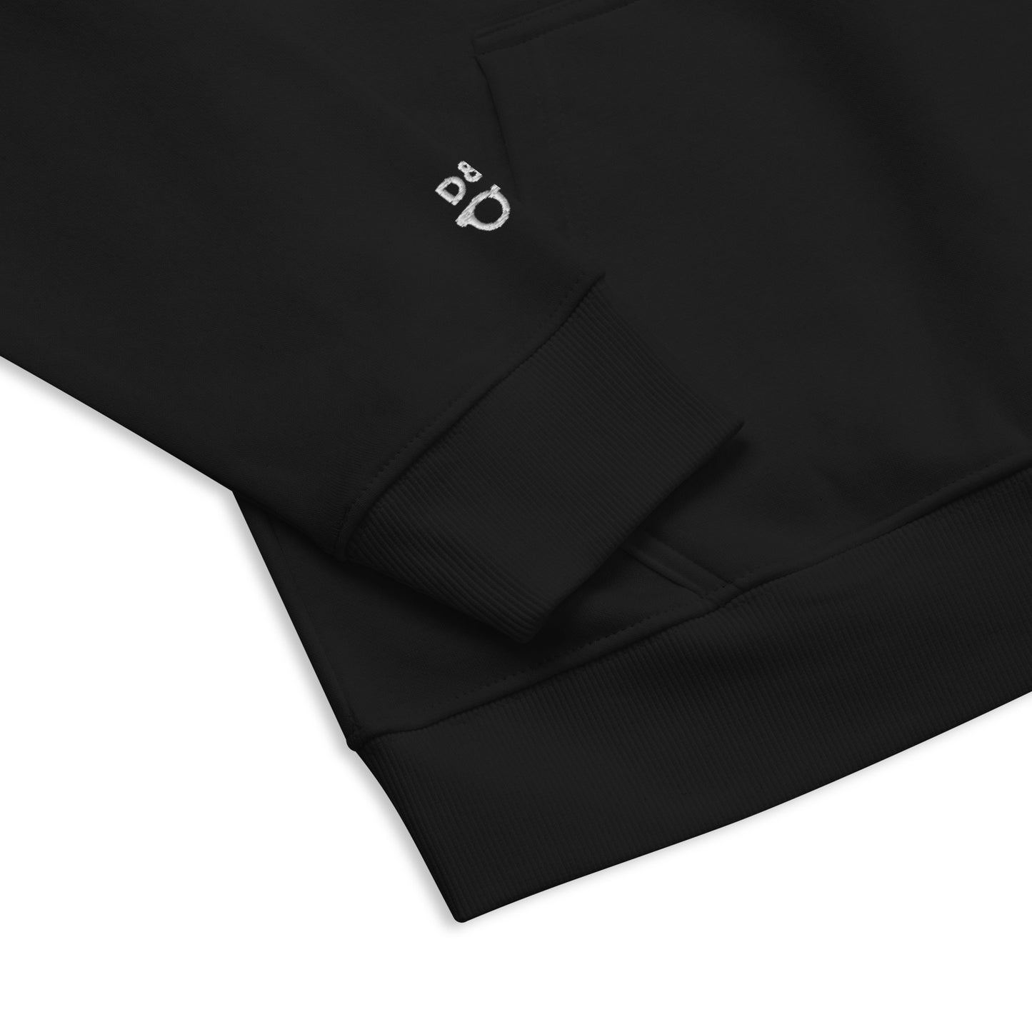 Close up of a black long sleeve hoodie with embroidery of dude and madam logo and cuff details 