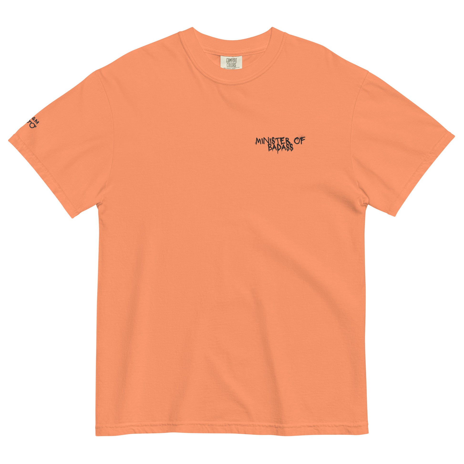 Orange t-shirt displaying a 'Minister of Badass' design with a detailed text in black, ideal for streetwear enthusiasts