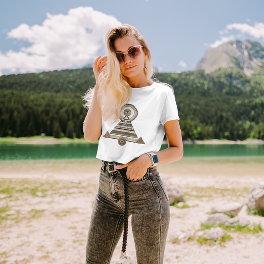 Woman wearing a Pyramid Eye Crop Top from the Cleopatra Collection, featuring a mystical pyramid eye design, perfect for a trendy and edgy look