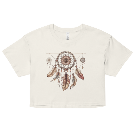 Off White crop top with an intricate dreamcatcher design, featuring floral and feather elements from the Catching Dreams Collection